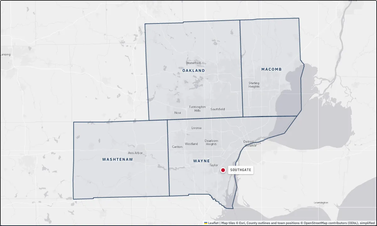 Map of Wayne, Oakland, Washtenaw and Macomb County, Michigan, with the four county outlines and a pin on Southgate